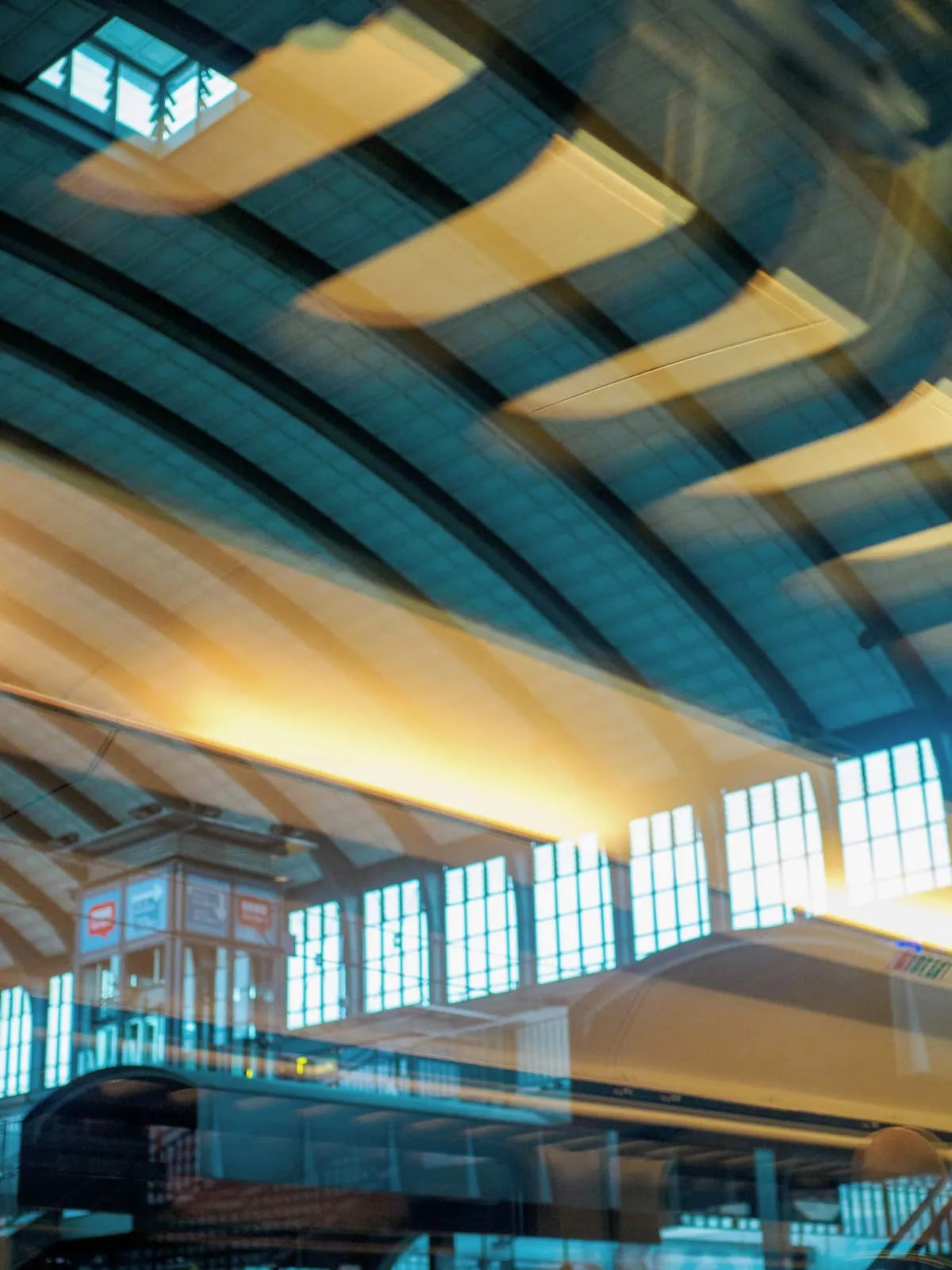 Station hall roof with striped light, tilted and blurred, 2023