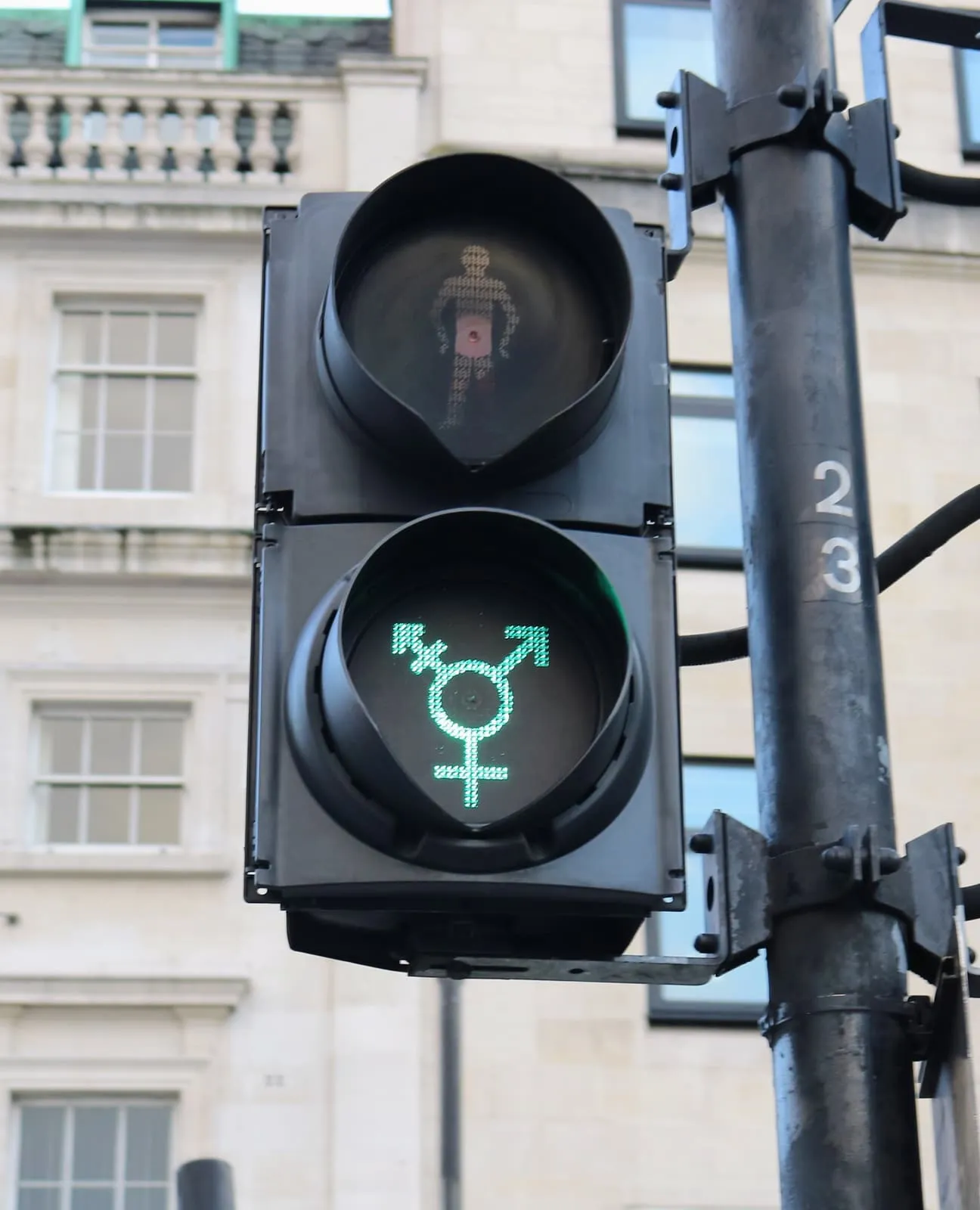 Pedestrian light showing a green gender symbol, 2017