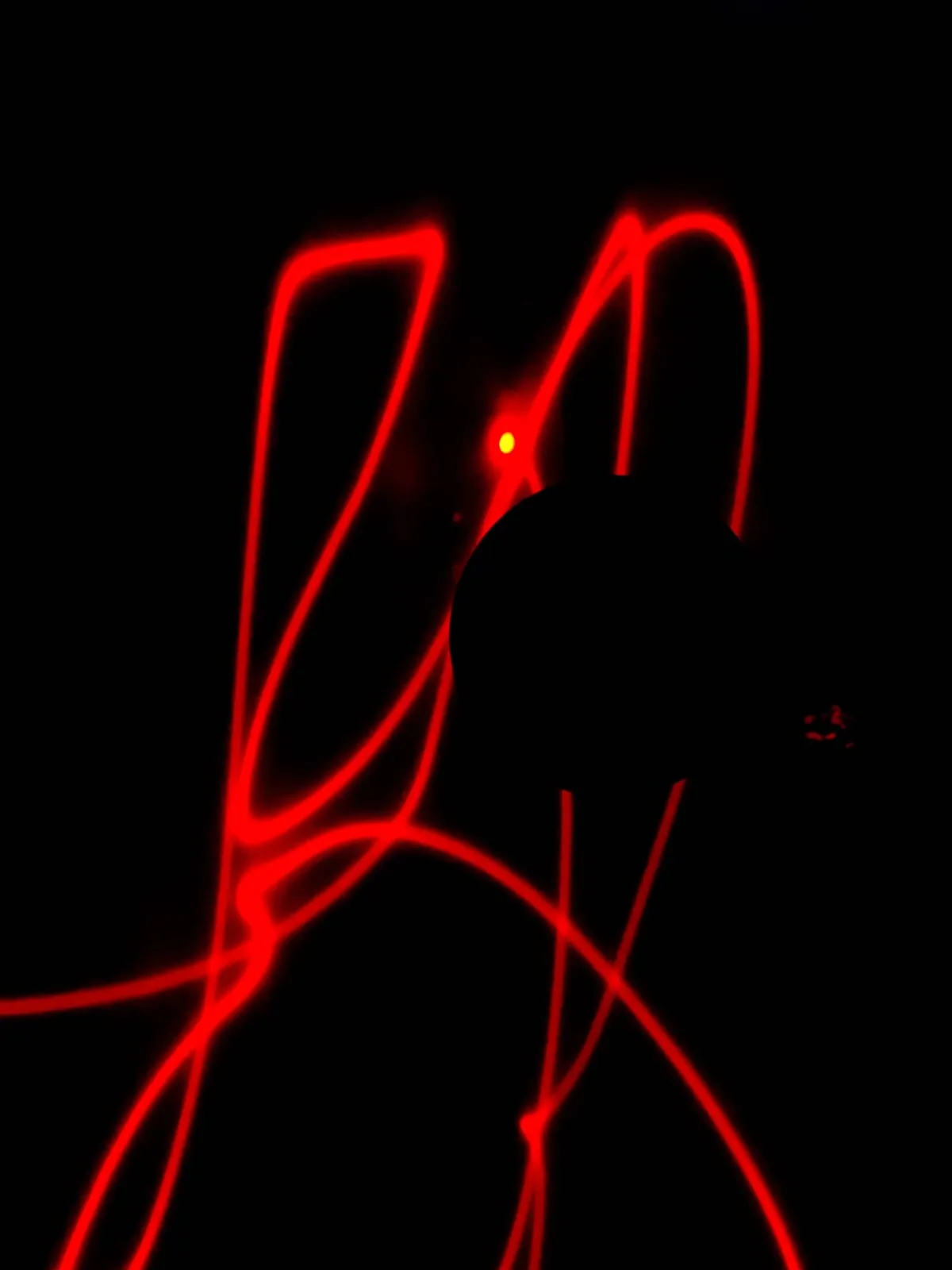 Red light trails on black, 2020