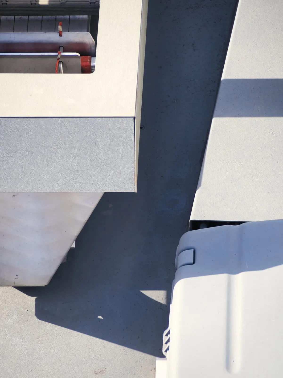 Hard shadows across white and grey surfaces, 2021