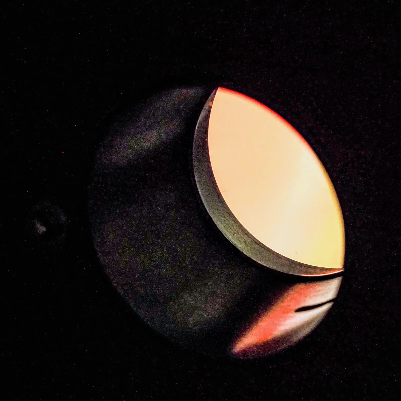 Round lamp glowing in the dark, 2023