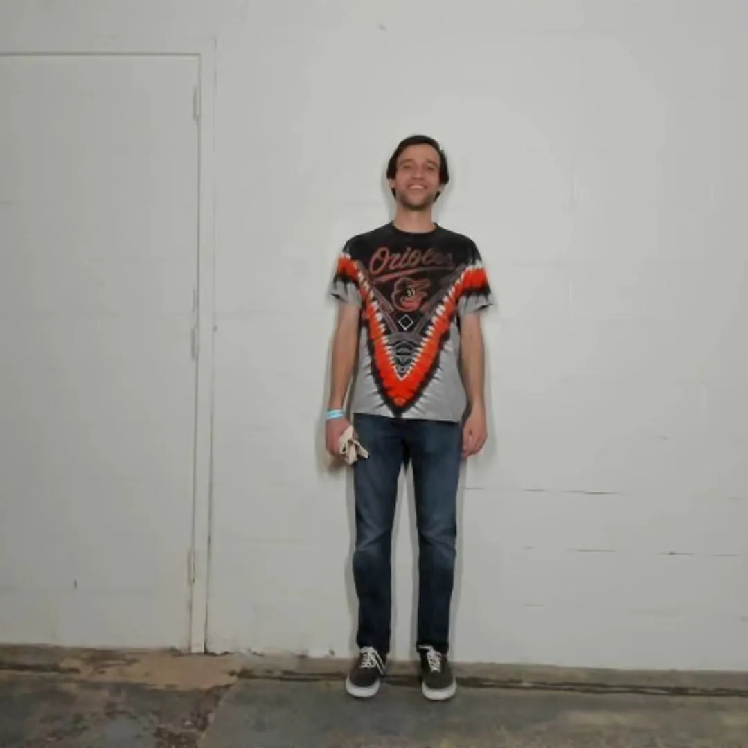 PORTRAIT OF AN ADULT WEARING KIDS' CLOTHING - Ross Goodwin (VERSA)